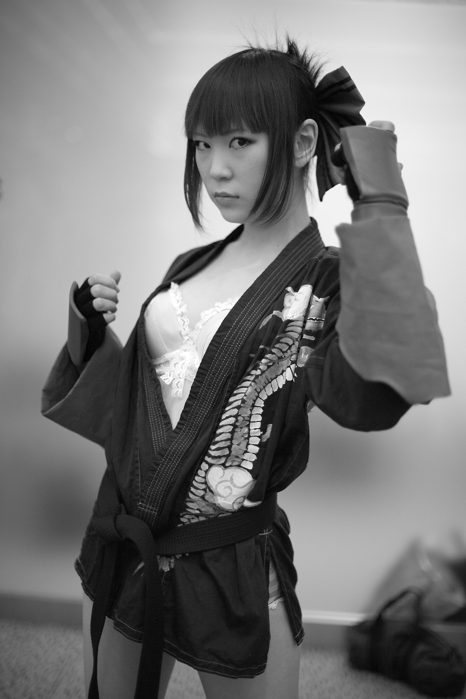 kabi, aihara makoto, rumble roses, striped, highres, photo (medium), bow, bra, cosplay, gloves, hair bow, lingerie, monochrome, open gi, panties, the black belt demon, underwear