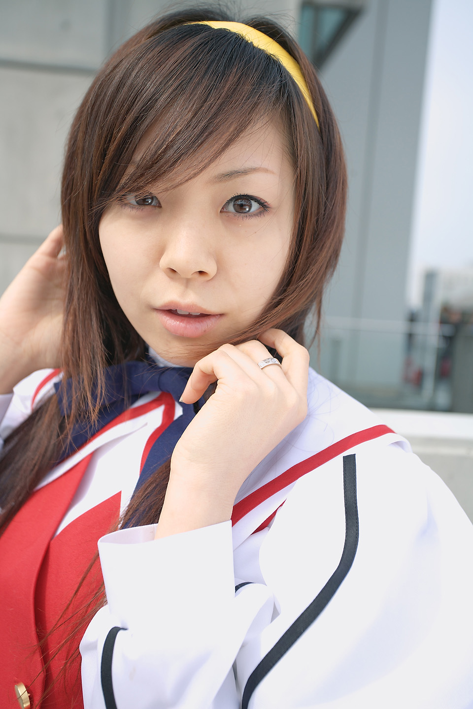 souhi makoto, himemiya chikane, kannazuki no miko, highres, photo (medium), 1girl, asian, blurry, brown hair, cosplay, depth of field, dyed hair, female focus, hairband, himemiya chikane (cosplay), japanese (nationality), jewelry, looking at viewer, outdoors, parted lips, ring, school uniform, solo