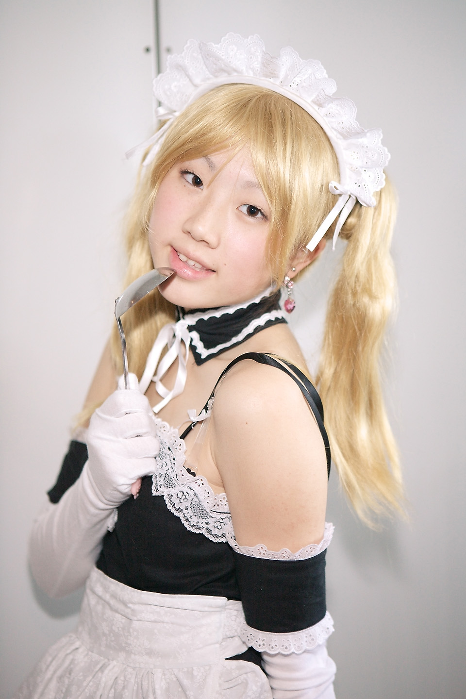 hime (cosplayer), sawatari izumi, kore ga watashi no goshujin-sama, highres, photo (medium), 1girl, apron, asian, bare shoulders, blonde hair, brown eyes, cosplay, detached collar, earrings, elbow gloves, female focus, gloves, indoors, japanese (nationality), jewelry, ladle, looking at viewer, maid, maid apron, maid headdress, nakabayashi yoshitaka's maid uniform, sawatari izumi (cosplay), solo, twintails, white gloves