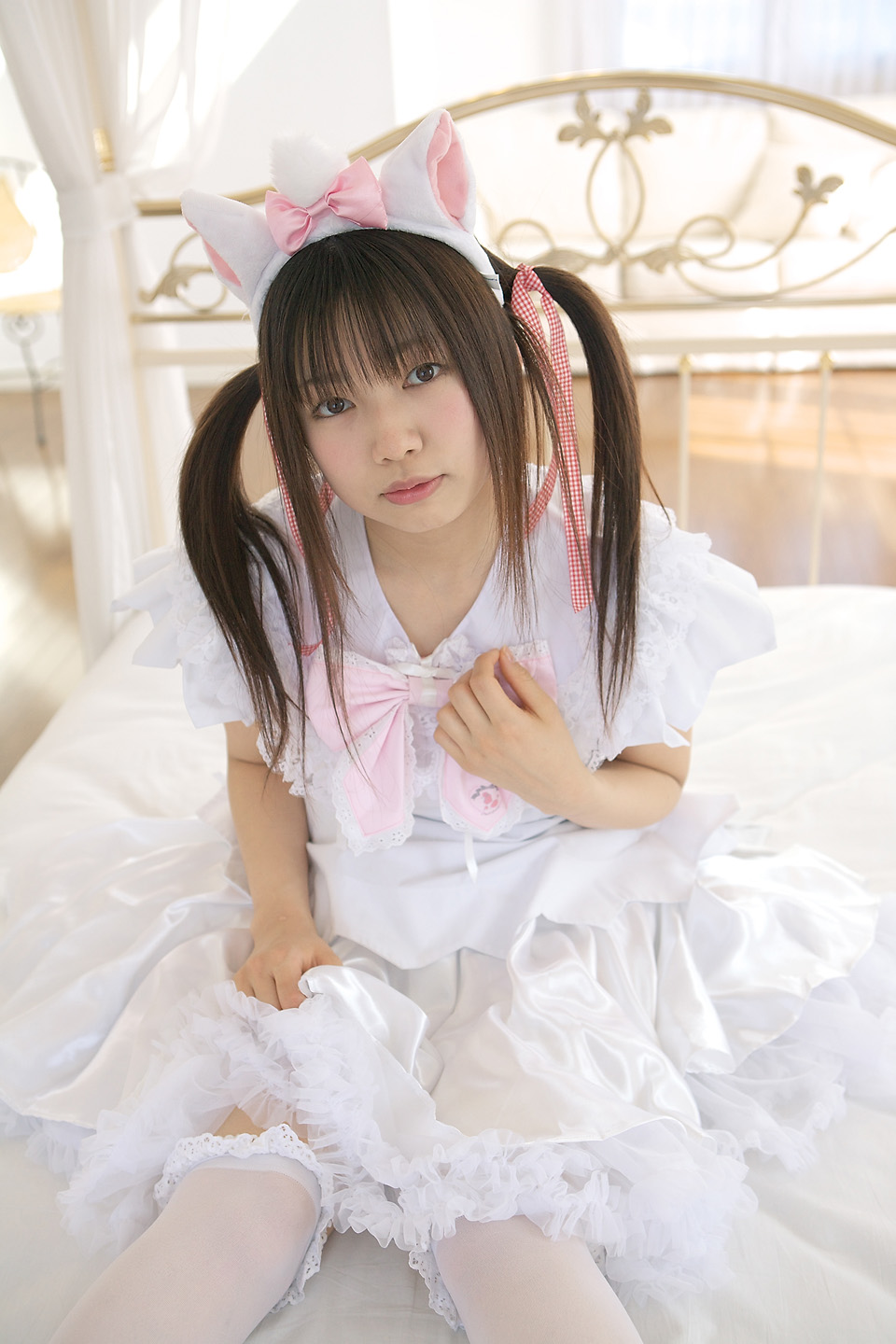 sakura yayoi, marie, highres, photo (medium), animal ears, aristocats, bed, cat ears, cosplay, dress, frilled dress, frills, kneehighs, lace, socks, twintails