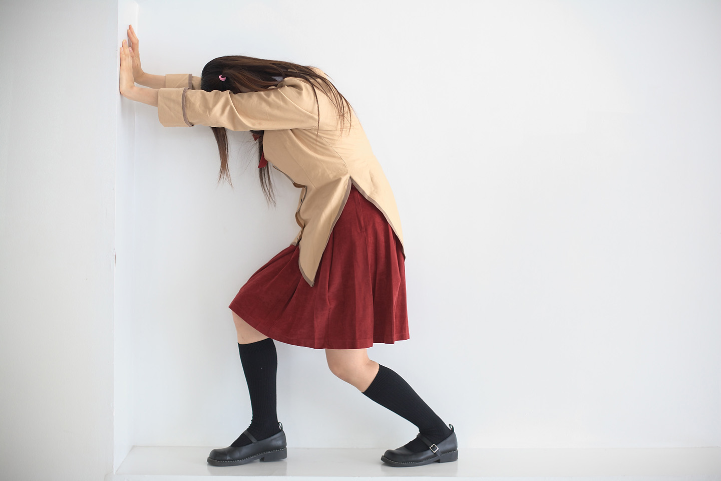sakura yayoi, tsukamoto tenma, school rumble, photo (medium), 1girl, asian, blazer, brown hair, cosplay, female focus, indoors, jacket, kneehighs, long hair, school uniform, simple background, skirt, socks, solo, twin ahoge, twintails, two side up, white background