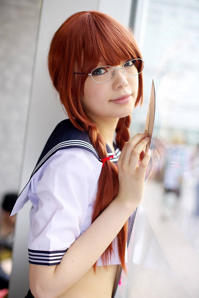 namada, arisugawa shii, the art of yamashita shunya, highres, photo (medium), 1girl, against glass, aqua eyes, arisugawa shii (cosplay), asian, blue eyes, blurry, braid, brown hair, color contacts, cosplay, crop top, depth of field, dutch angle, female focus, glasses, green eyes, indoors, lensless glasses, long hair, looking at viewer, midriff, sailor, school uniform, serafuku, short sleeves, solo, sword, twin braids, weapon