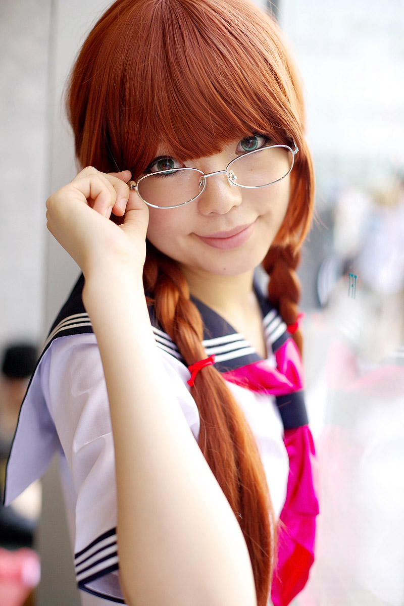 namada, arisugawa shii, the art of yamashita shunya, highres, photo (medium), 1girl, against glass, aqua eyes, arisugawa shii (cosplay), asian, blue eyes, blurry, braid, brown hair, color contacts, cosplay, depth of field, female focus, glasses, green eyes, indoors, lensless glasses, long hair, looking at viewer, looking over eyewear, sailor, school uniform, serafuku, short sleeves, solo, sword, twin braids, weapon