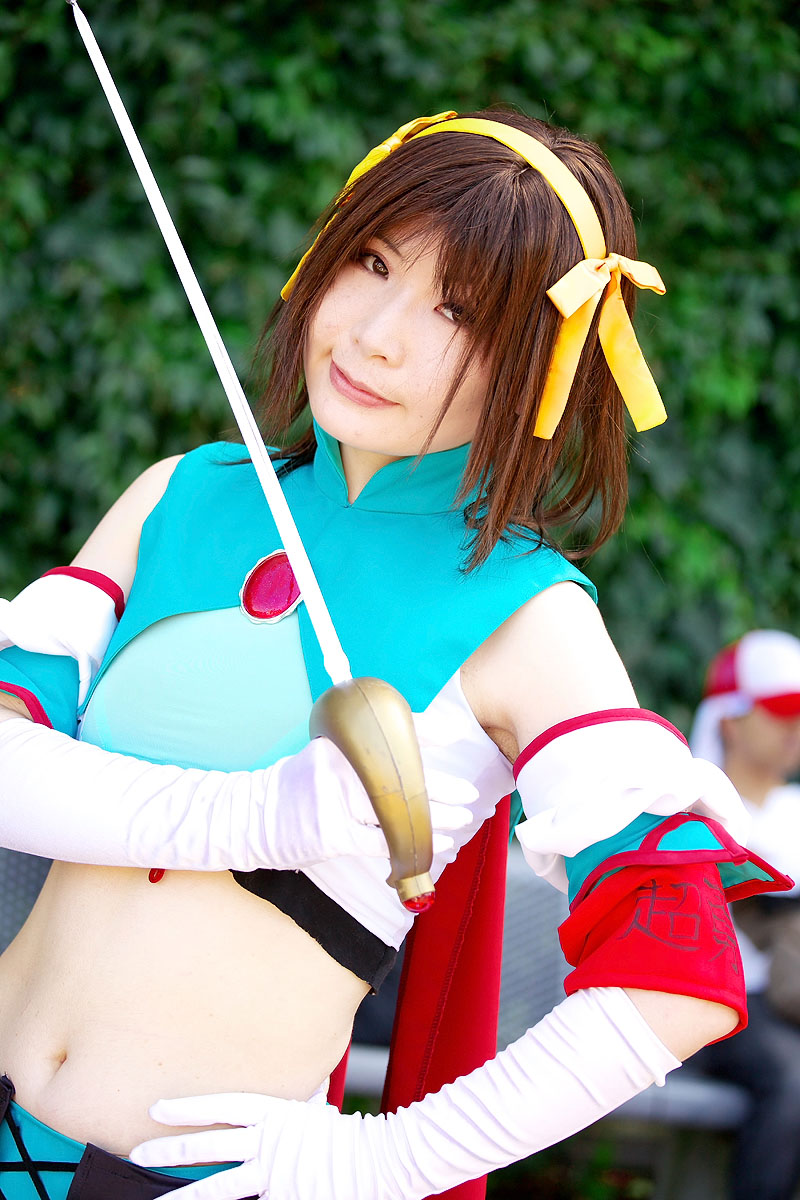 suzumiya haruhi, suzumiya haruhi no tomadoi, suzumiya haruhi no yuuutsu, highres, photo (medium), armband, cape, cosplay, hair ribbon, halterneck, midriff, ousawa karin, ribbon, sword, weapon