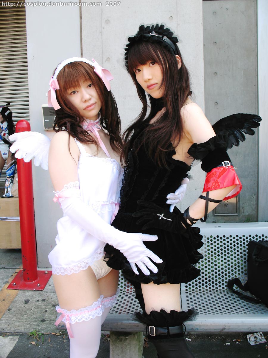 azumagawa aimi, suzuyuki kaho, diana (vispo), morte (vispo), vispo original, black legwear, white legwear, highres, photo (medium), tagme, 2007, 3girls, arm laces, armband, asian, bare shoulders, bench, black dress, black wings, chemise, collar, cosplay, dress, dyed hair, elbow gloves, gloves, gothic lolita, hairband, japanese (nationality), lingerie, lolita fashion, lolita hairband, looking at viewer, multiple girls, outdoors, panties, short dress, standing, thighhighs, underwear, watermark, web address, white gloves, white panties, white wings, wings, zettai ryouiki