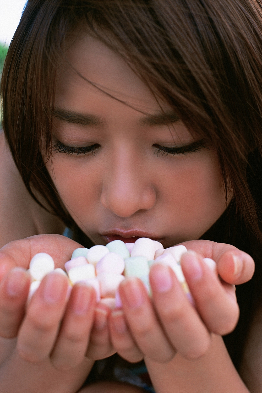 kamata natsumi, highres, photo (medium), tagme, 1girl, asian, blurry, brown hair, close-up, depth of field, female focus, food, japanese (nationality), lip gloss, marshmallow, solo
