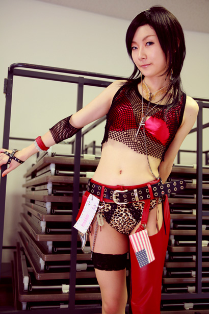 kouya (model), character request, photo (medium), source request, animal print, asian, bra, chaps, cosplay, fishnets, flag, leopard print, lingerie, midriff, panties, see-through clothes, tank top, underwear
