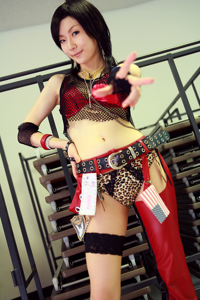kouya (model), character request, photo (medium), source request, animal print, asian, bra, chaps, cosplay, fishnets, flag, leopard print, lingerie, midriff, panties, see-through clothes, tank top, underwear