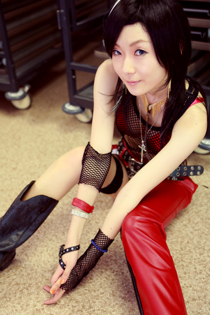 kouya (model), character request, photo (medium), source request, animal print, asian, boots, bra, chaps, cosplay, fishnets, flag, leopard print, lingerie, midriff, panties, see-through clothes, tank top, underwear
