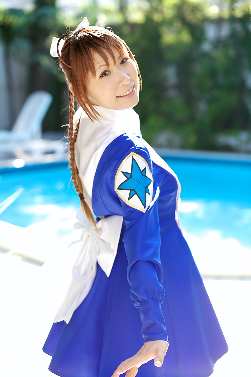 chippi, arika yumemiya, my-otome, highres, photo (medium), 1girl, arika yumemiya (cosplay), asian, blue eyes, blurry, braid, color contacts, cosplay, depth of field, female focus, long hair, looking at viewer, looking back, outdoors, smile, solo, standing, twin braids, ultimate blue sky