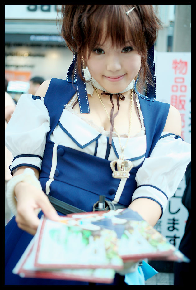 kipi-san, acasius boarding school, photo (medium), 1girl, asian, breasts, brown eyes, brown hair, cleavage, cosplay, detached sleeves, female focus, hair ribbon, looking at viewer, mole, religious offering, ribbon, school uniform, short hair, small breasts, smile, solo