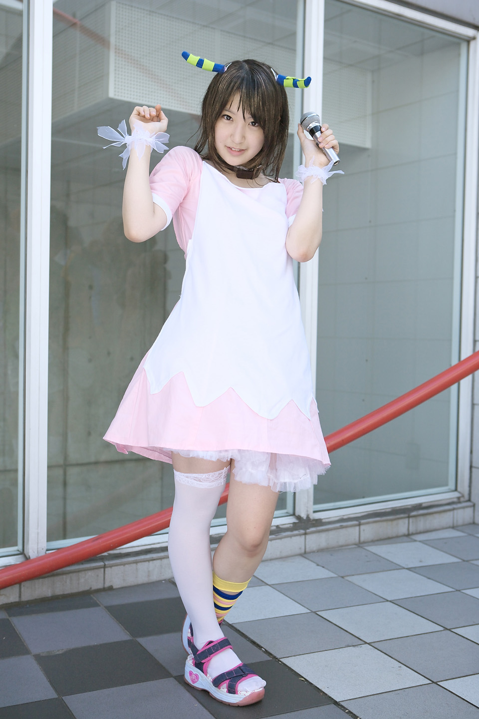 richi, linda (boku to maou), boku to maou, highres, photo (medium), apron, cosplay, dress, horns, kneehighs, microphone, single sock, socks
