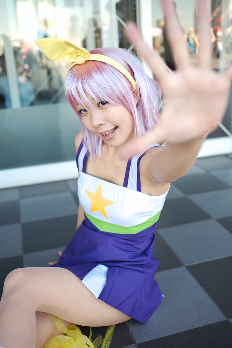 hiiragi tsukasa, lucky star, highres, photo (medium), bow, cheerleader, cosplay, hair bow, maritsuki haru, pom pom (cheerleading), purple hair
