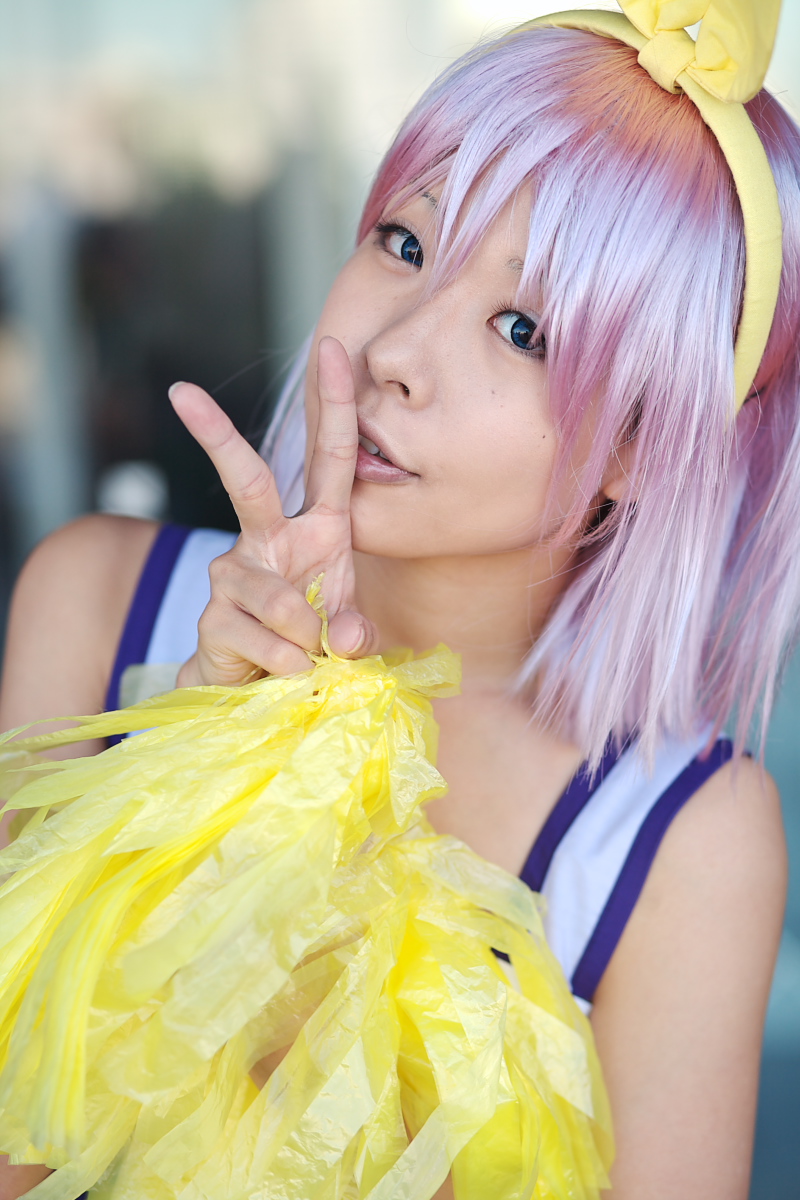 hiiragi tsukasa, lucky star, highres, photo (medium), bow, cheerleader, cosplay, hair bow, maritsuki haru, pom pom (cheerleading), purple hair