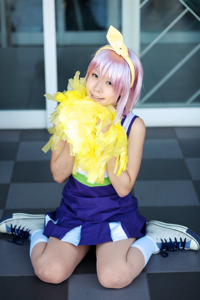 hiiragi tsukasa, lucky star, highres, photo (medium), bow, cheerleader, cosplay, hair bow, maritsuki haru, pom pom (cheerleading), purple hair