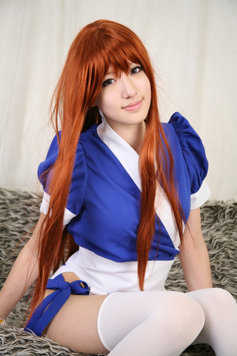 saya (cosplayer), kasumi (doa), dead or alive, tecmo, highres, photo (medium), 1girl, asian, cosplay, couch, curtains, female focus, indoors, kasumi (doa) (cosplay), long hair, looking at viewer, ninja, pelvic curtain, red hair, solo, thighhighs, white thighhighs