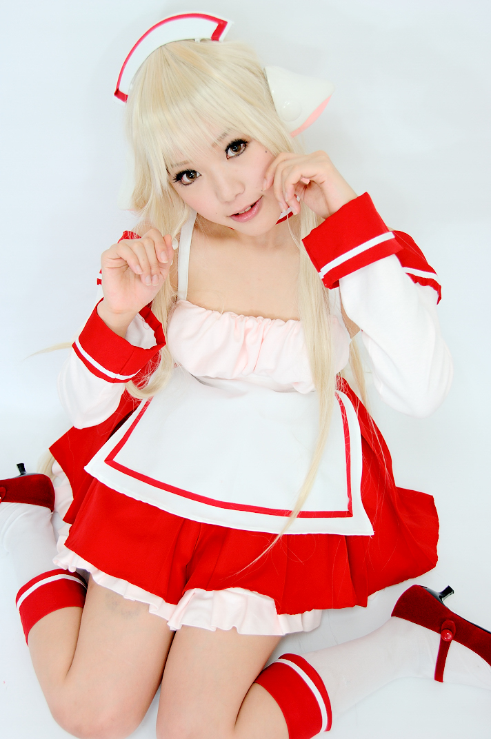 kipi-san, chii, chobits, photo (medium), 1girl, apron, asian, bare shoulders, blonde hair, breasts, bruise, chii (cosplay), cosplay, detached sleeves, dress, female focus, indoors, injury, long hair, looking at viewer, maid, maid apron, mary janes, on floor, persocom, petite, shoes, sidelocks, sitting, small breasts, socks, solo, waist apron, wariza