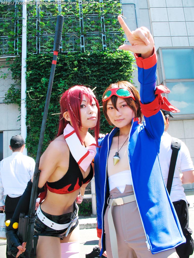 sena (model), simon (ttgl), sora (model), yoko littner, tengen toppa gurren lagann, photo (medium), bikini, bikini top only, cosplay, gloves, goggles, midriff, red hair, shorts, swimsuit, thighhighs