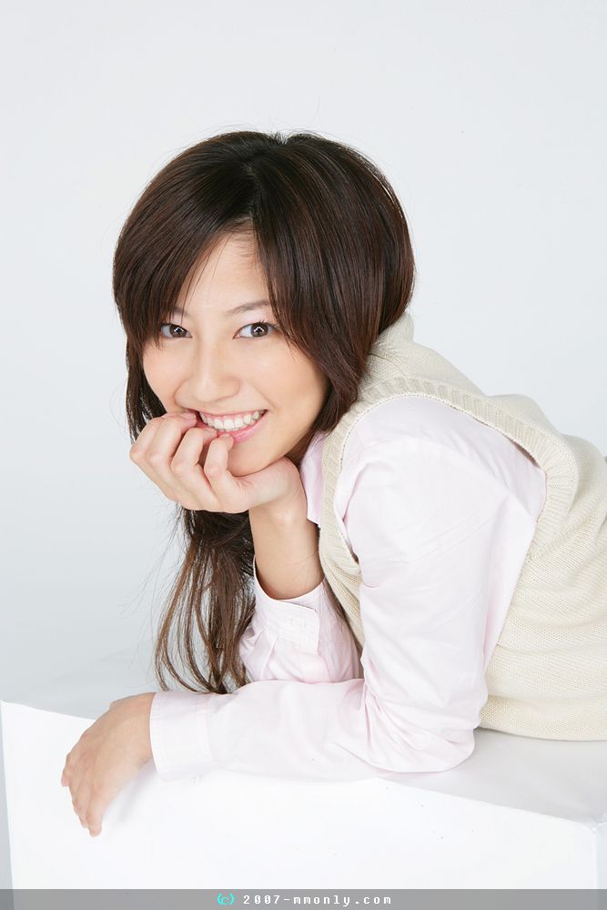 sugimoto yumi, photo (medium), 00s, 1girl, 2007, asian, brown eyes, brown hair, cosplay, female focus, head rest, long hair, long sleeves, looking at viewer, school uniform, shirt, smile, solo, sweater vest, watermark, web address, white shirt