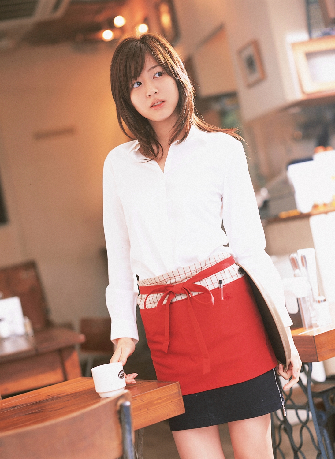 sugimoto yumi, highres, photo (medium), 1girl, apron, asian, brown hair, cosplay, female focus, indoors, long hair, miniskirt, skirt, solo, tray, waitress