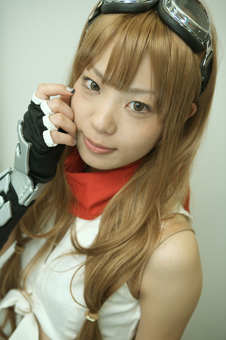 sayoko (iczer-1), character request, highres, photo (medium), source request, blonde hair, cosplay, elbow gloves, fingerless gloves, gloves, goggles, twintails
