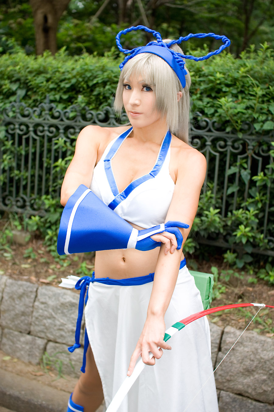 igarashi nao (model), majikina mina, samurai spirits, silver hair, highres, photo (medium), bow, breasts, cleavage, cosplay, hair bow, halterneck, midriff