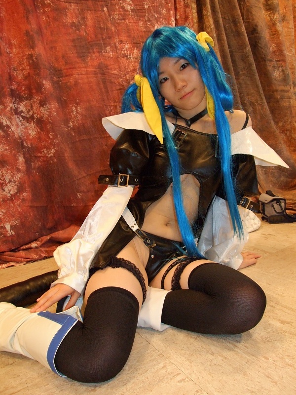 dizzy (guilty gear), kabura hitori (model), arc system works, guilty gear, photo (medium), blue hair, boots, breasts, cosplay, midriff, thighhighs, twintails, underboob