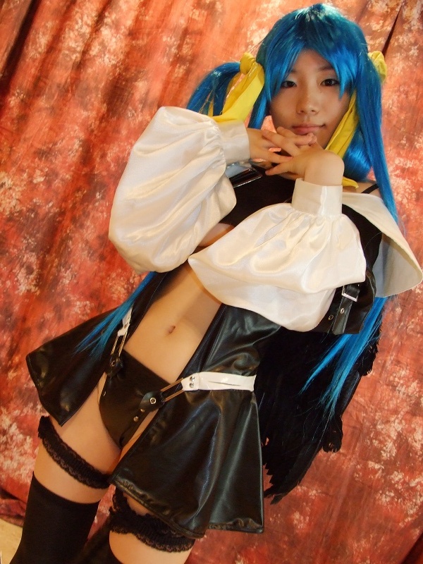 dizzy (guilty gear), kabura hitori (model), arc system works, guilty gear, photo (medium), blue hair, boots, breasts, cosplay, midriff, thighhighs, twintails, underboob