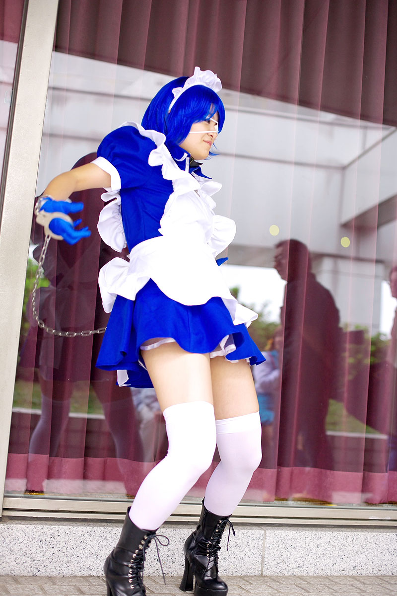 riori, ryomou shimei, ikkitousen, highres, photo (medium), apron, cosplay, cuffs, eyepatch, gloves, handcuffs, maid, maid apron, ryomou shimei (cosplay), thighhighs