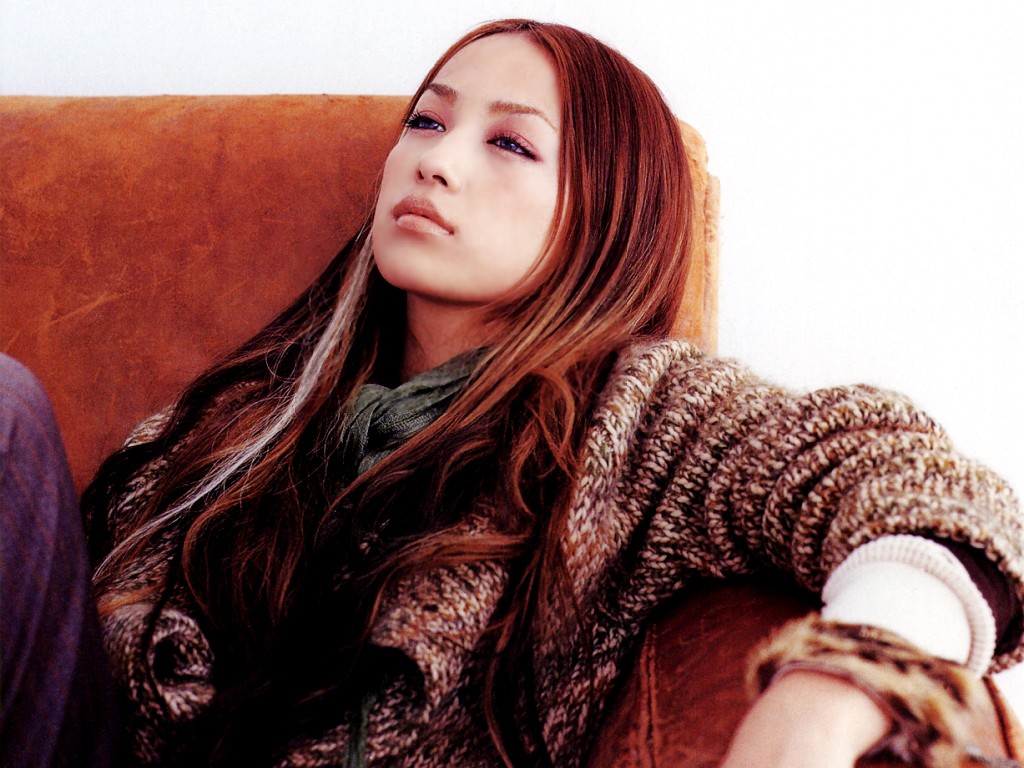nakashima mika, real life, photo (medium), tagme, 1girl, brown hair, couch, half-closed eyes, long hair, sweater, white background