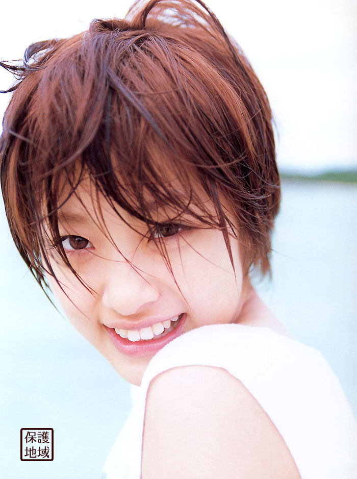 ueto aya, photo (medium), tagme, 1girl, brown eyes, brown hair, female focus, looking at viewer, outdoors, smile, solo, tank top, wet