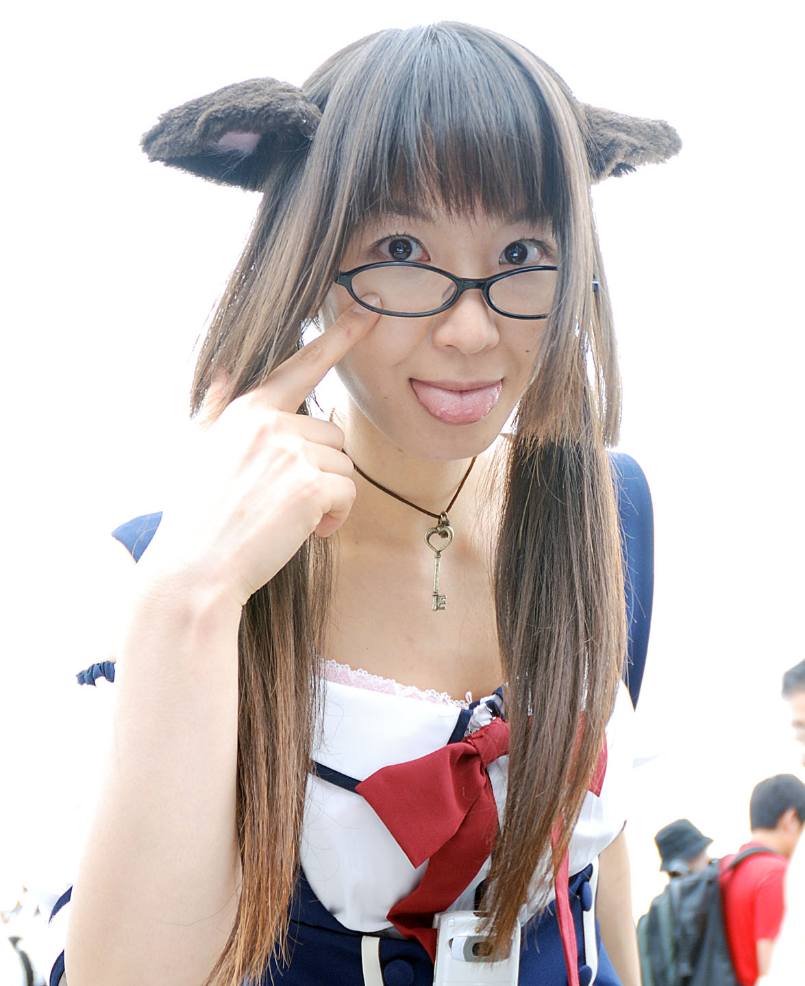 maico (model), acasius boarding school, highres, photo (medium), 1girl, :p, animal ears, asian, brown eyes, brown hair, cosplay, dog ears, fake animal ears, glasses, leaning forward, long hair, looking at viewer, mole, multiple boys, multiple girls, outdoors, school uniform, solo focus, tongue, tongue out