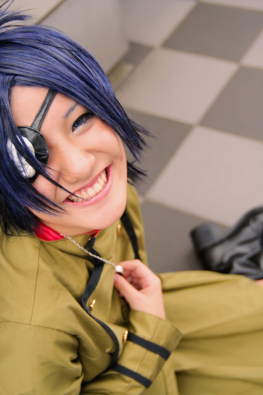 isumi (i-spixi), chrome dokuro, kateikyoushi hitman reborn, katekyo hitman reborn!, highres, photo (medium), 1girl, blue eyes, blue hair, boots, checkered floor, cosplay, eyepatch, female focus, floor, jewelry, matching hair/eyes, necklace, pleated skirt, sitting, skirt, smile, solo