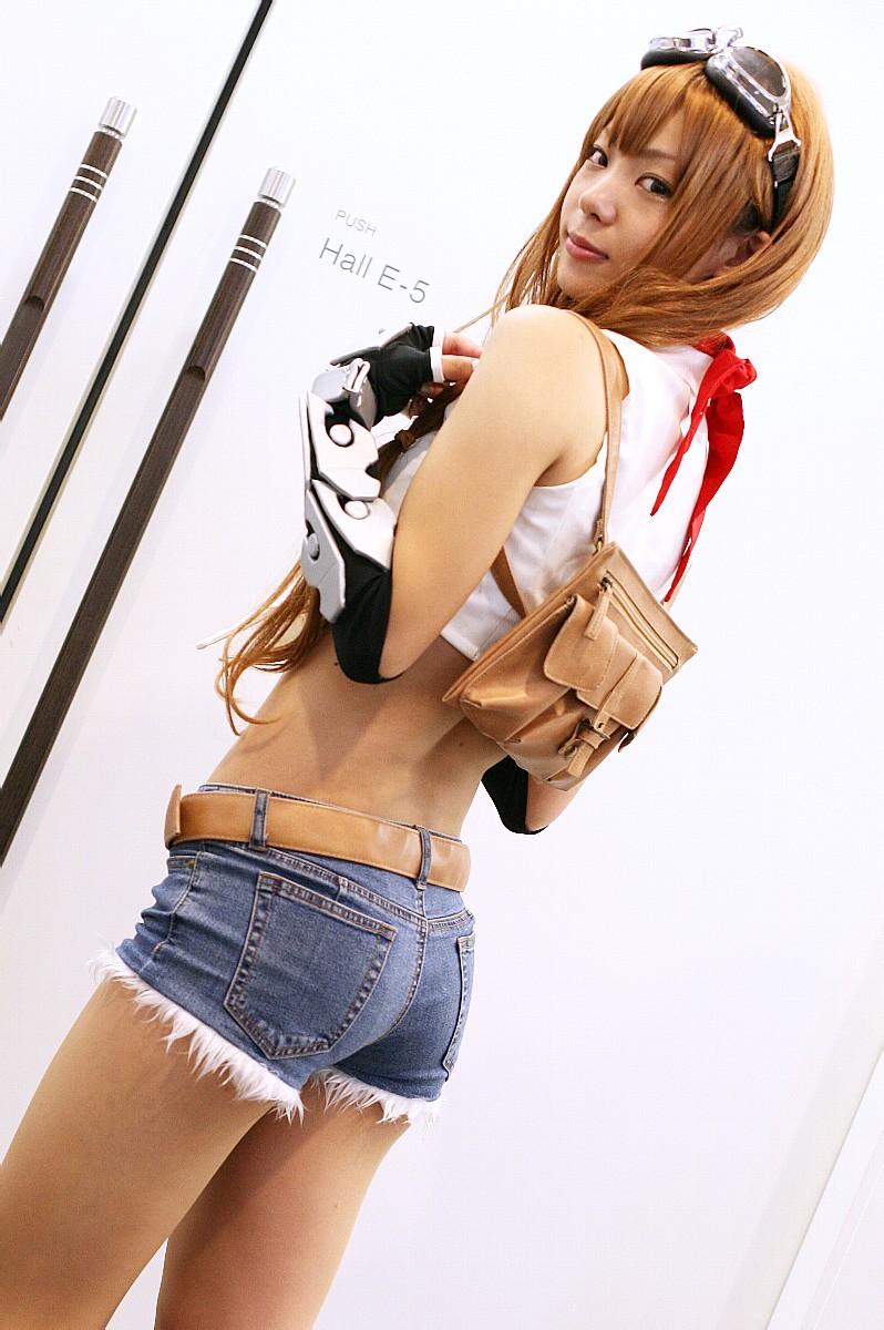 sayoko (iczer-1), character request, highres, photo (medium), source request, ass, blonde hair, cosplay, denim, elbow gloves, fingerless gloves, gloves, goggles, midriff, twintails