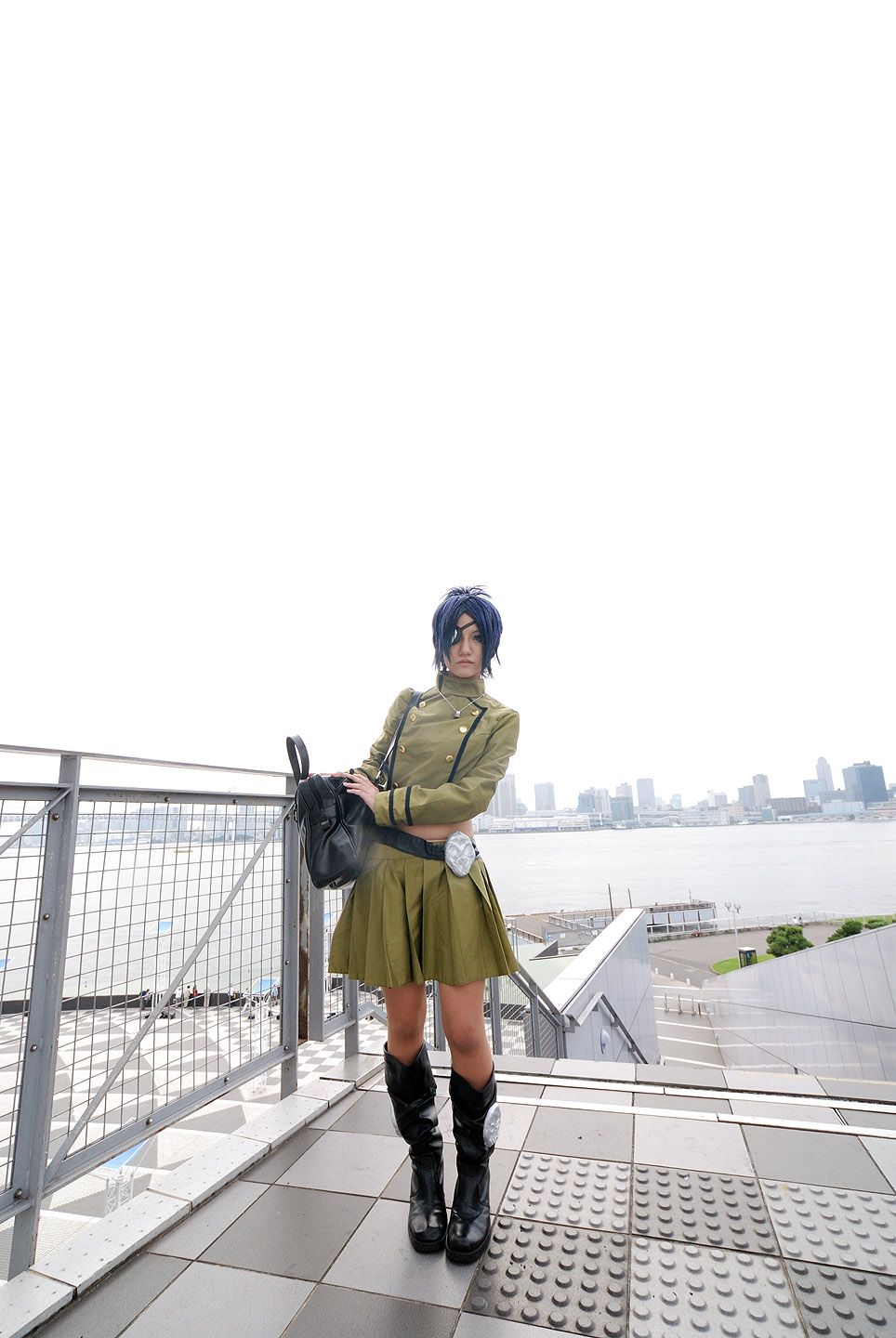 isumi (i-spixi), chrome dokuro, kateikyoushi hitman reborn, katekyo hitman reborn!, highres, photo (medium), 1girl, blue hair, boots, cityscape, cosplay, eyepatch, female focus, full body, jewelry, necklace, outdoors, pleated skirt, skirt, sky, solo, water
