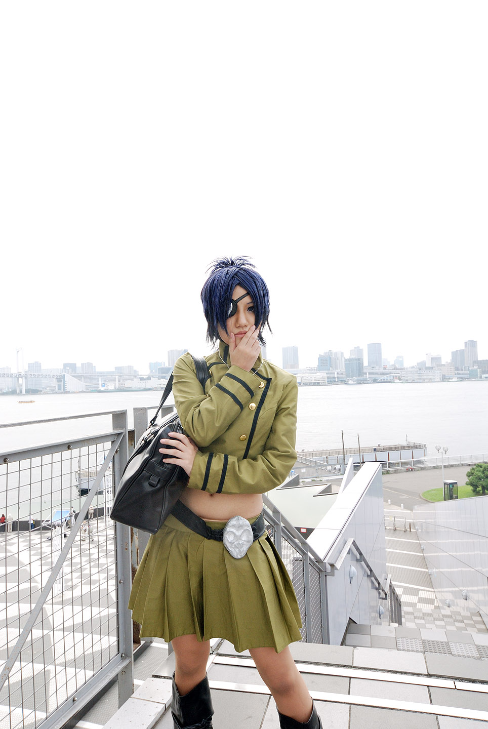 isumi (i-spixi), chrome dokuro, katekyo hitman reborn!, highres, photo (medium), 1girl, blue hair, boots, cosplay, eyepatch, female focus, midriff, outdoors, pleated skirt, skirt, solo
