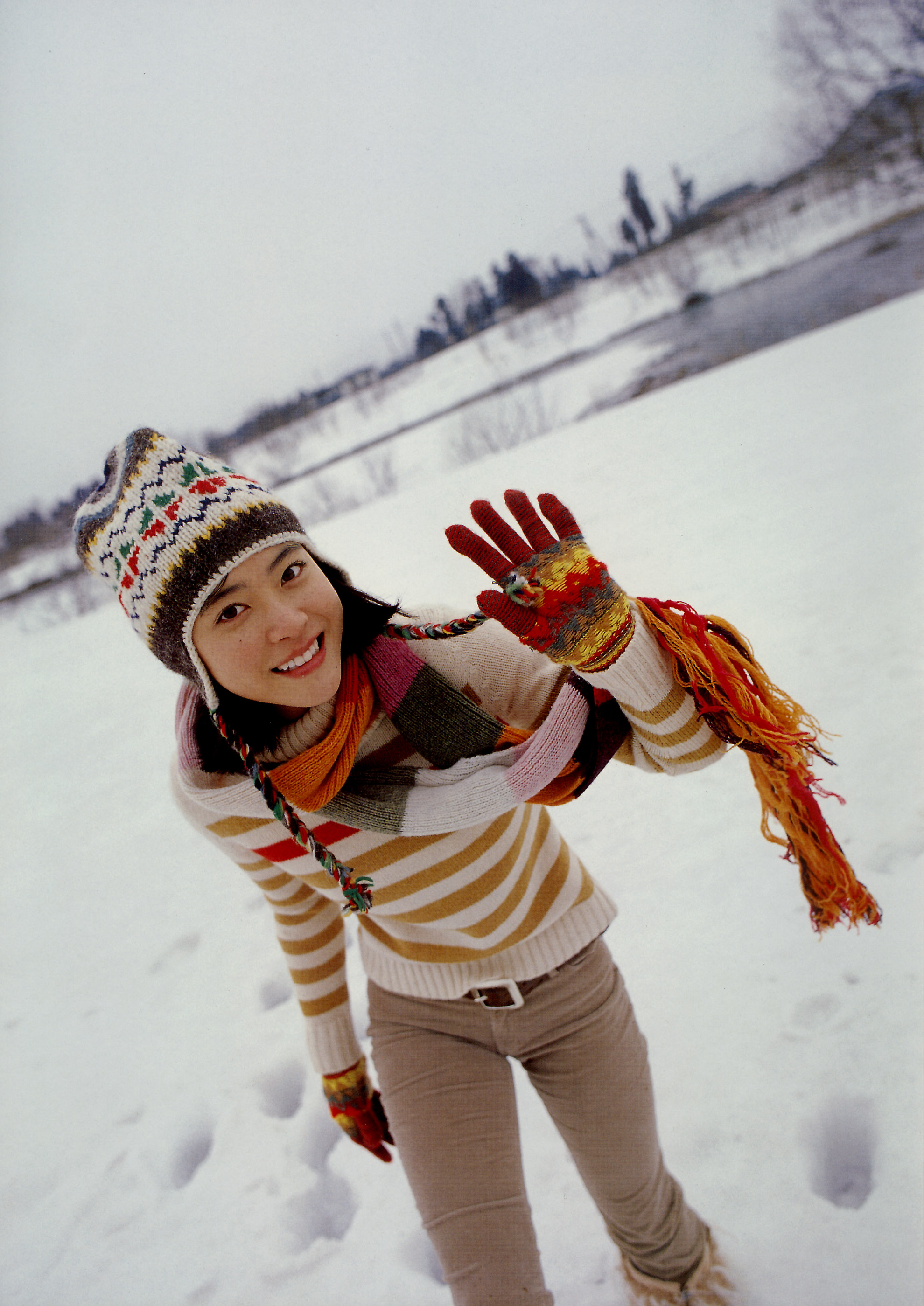 ueno juri, juri first, absurdres, highres, photo (medium), boots, denim, fur boots, gloves, jeans, knit hat, pants, scarf, snow, sweater
