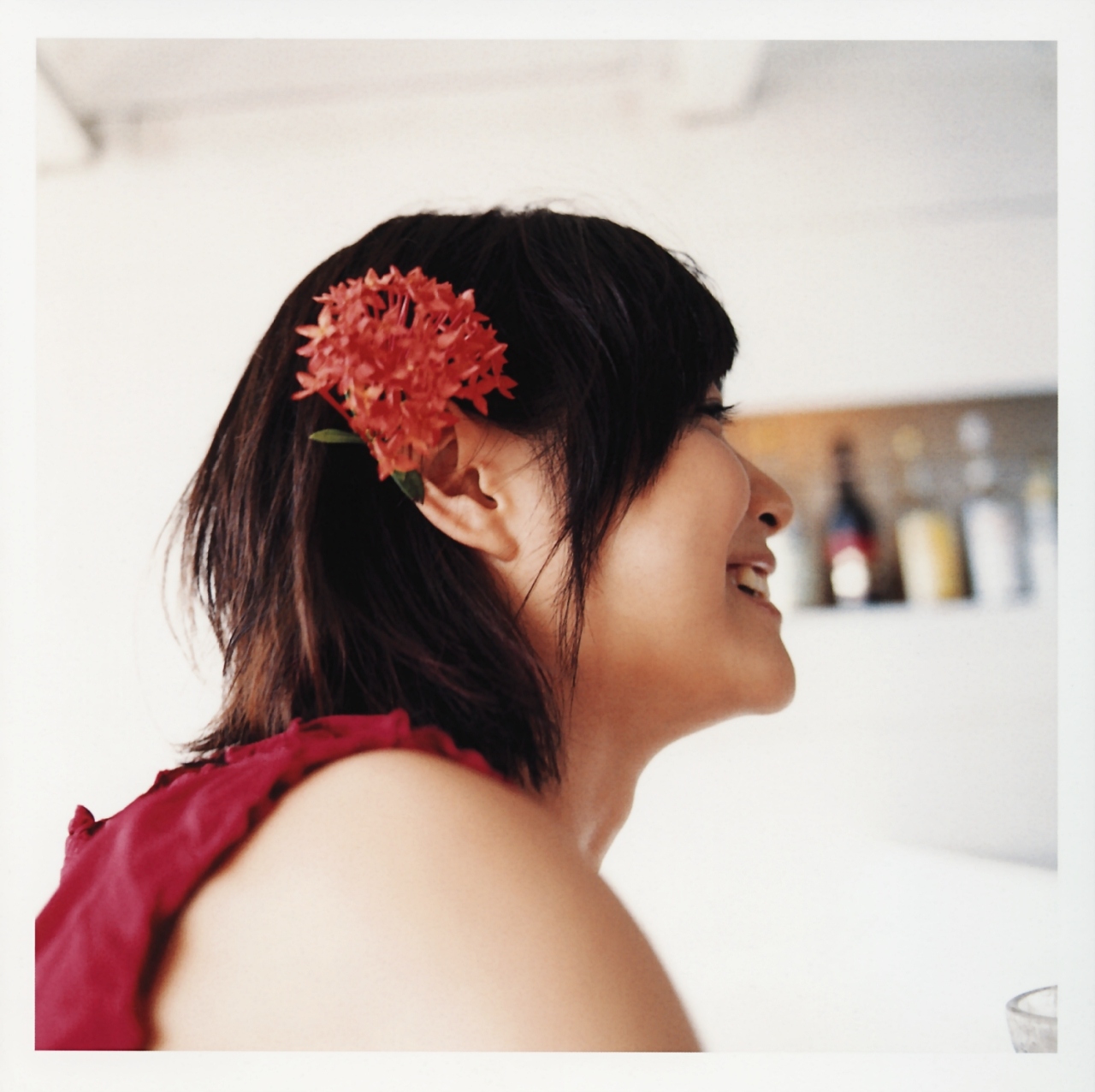 ueno juri, a piacere, highres, photo (medium), flower, hair flower, hair ornament, tank top