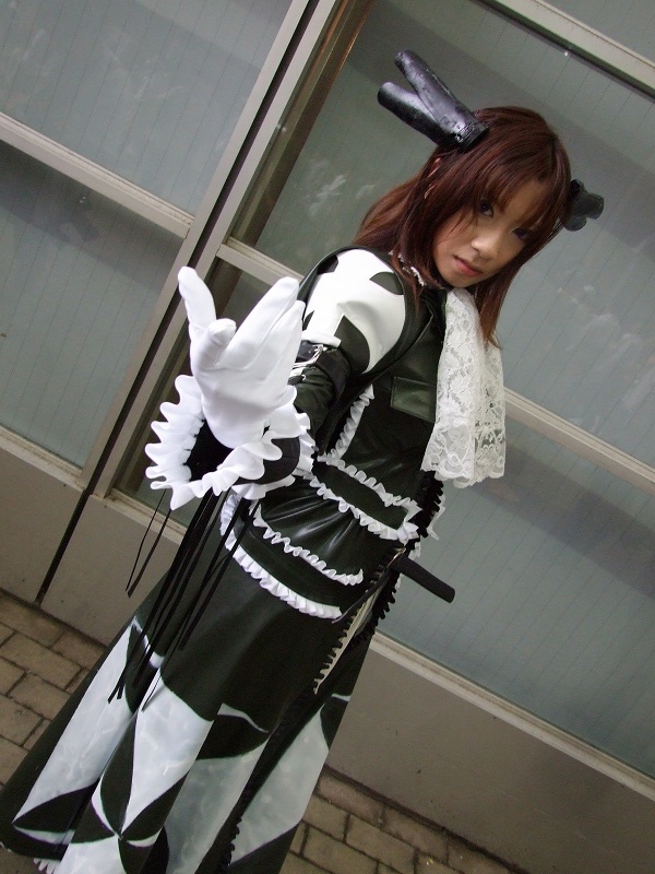 torai aki, sega, shining (series), shining wind, photo (medium), 1girl, asian, brown hair, coat, cosplay, dutch angle, female focus, gloves, long hair, looking at viewer, overcoat, scarf, solo, white gloves, xecty ein (cosplay)