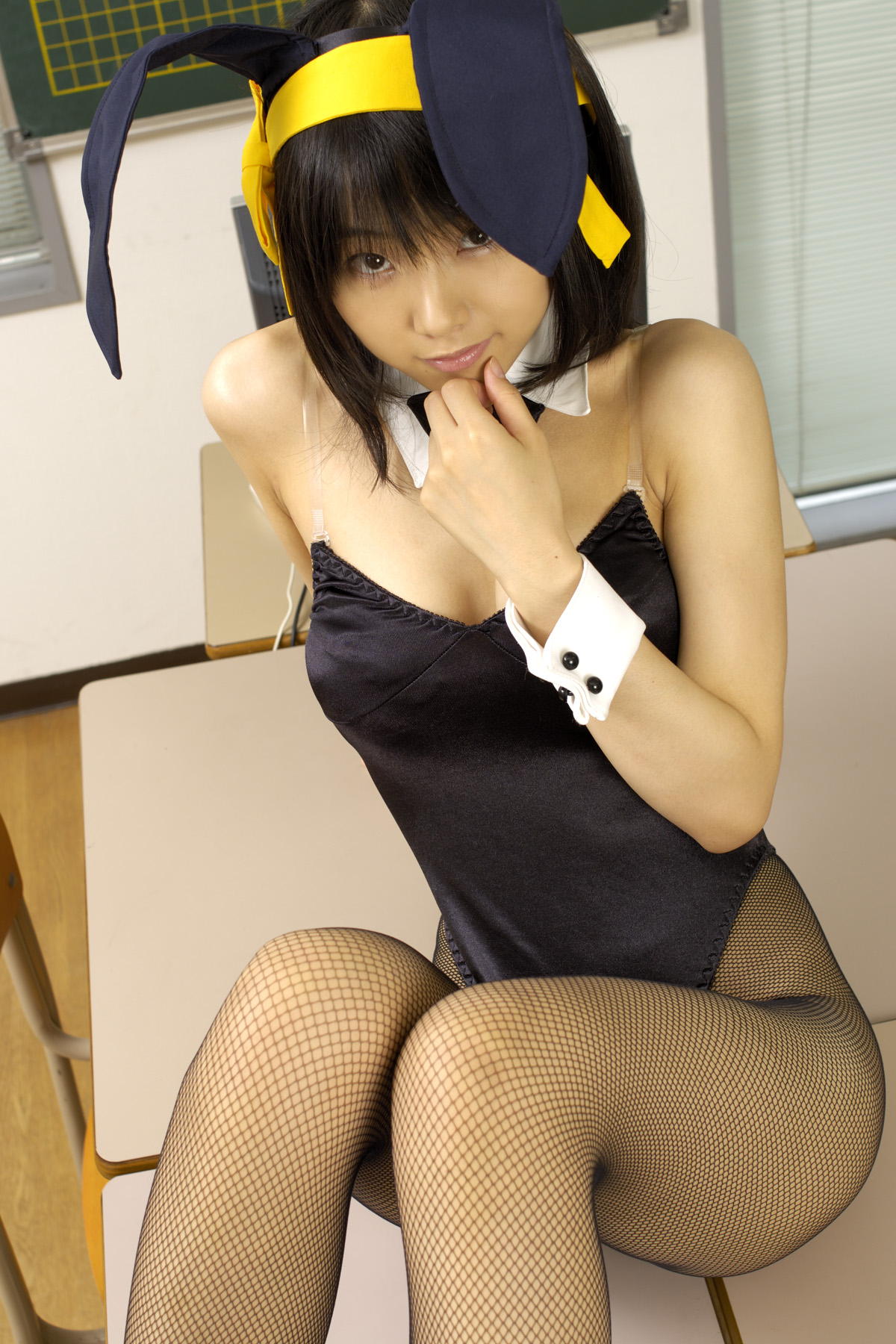 matsunaga ayaka, suzumiya haruhi, suzumiya haruhi no yuuutsu, fishnet legwear, highres, photo (medium), animal ears, asian, bow, bowtie, classroom, cosplay, costume, fake animal ears, fishnets, hair ribbon, leotard, playboy bunny, rabbit ears, ribbon, school, thighhighs