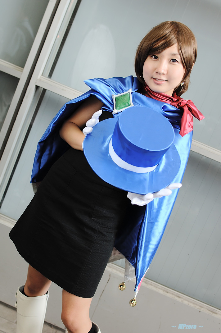 miasa, trucy wright, ace attorney, apollo justice ace attorney, capcom, photo (medium), 1girl, asian, boots, brown eyes, brown hair, cape, cosplay, dress, dutch angle, female focus, hat, looking at viewer, scarf, short dress, solo, top hat, trucy wright (cosplay)