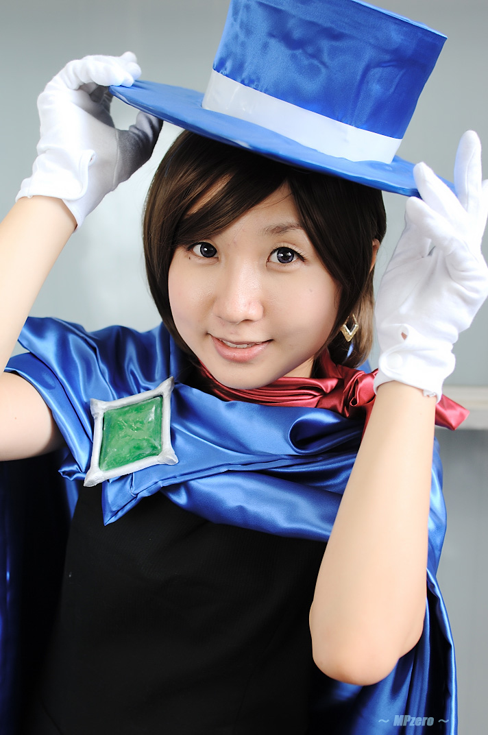 miasa, trucy wright, ace attorney, apollo justice ace attorney, capcom, photo (medium), 1girl, asian, brown eyes, brown hair, cape, cosplay, female focus, gloves, hat, looking at viewer, scarf, solo, top hat, trucy wright (cosplay), white gloves