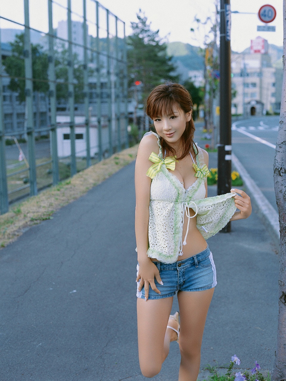 hoshino aki, highres, photo (medium), clothes lift, denim, rapture, shirt lift, shorts, tank top