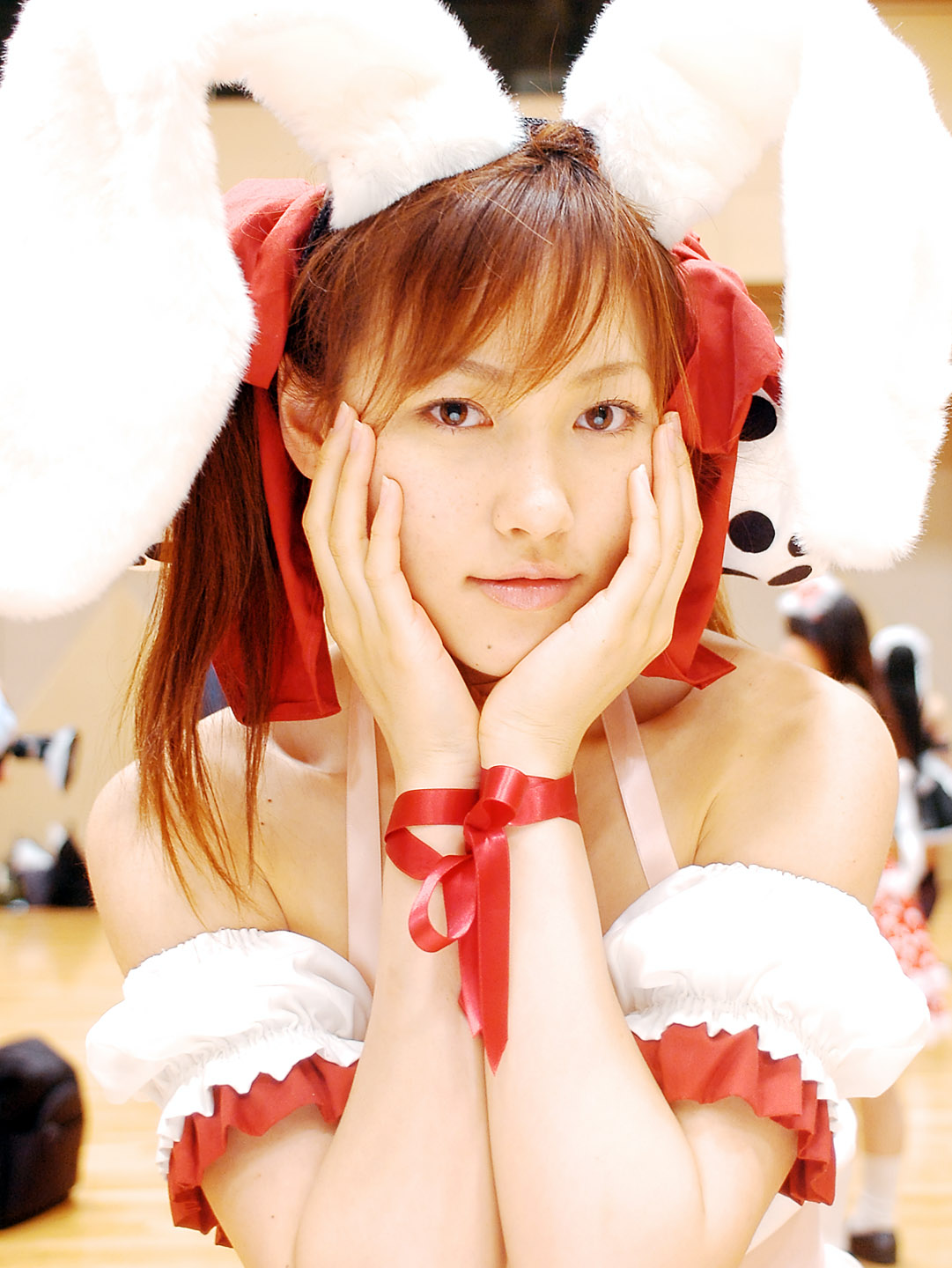 yuzu kotoki, usada hikaru, di gi charat, highres, photo (medium), animal ears, choker, cosplay, detached sleeves, dress, fuzzy dice, hair ribbon, laces, rabbit ears, ribbon, strapless, strapless dress