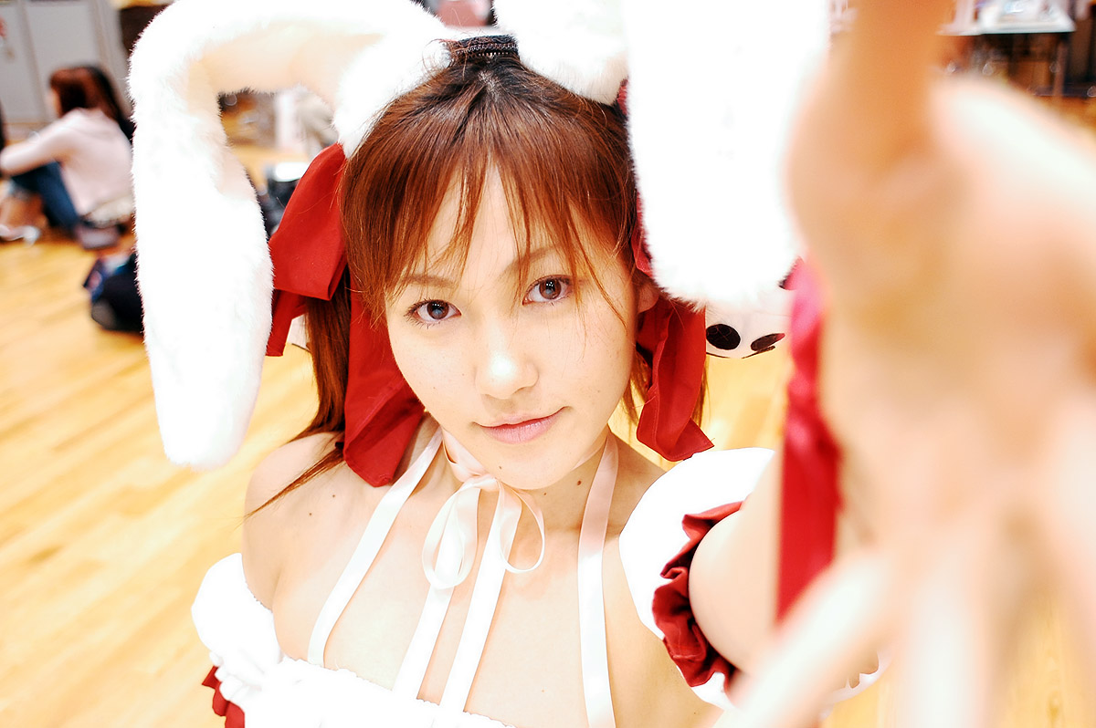 yuzu kotoki, usada hikaru, di gi charat, photo (medium), animal ears, choker, cosplay, detached sleeves, dress, fuzzy dice, hair ribbon, laces, rabbit ears, ribbon, strapless, strapless dress