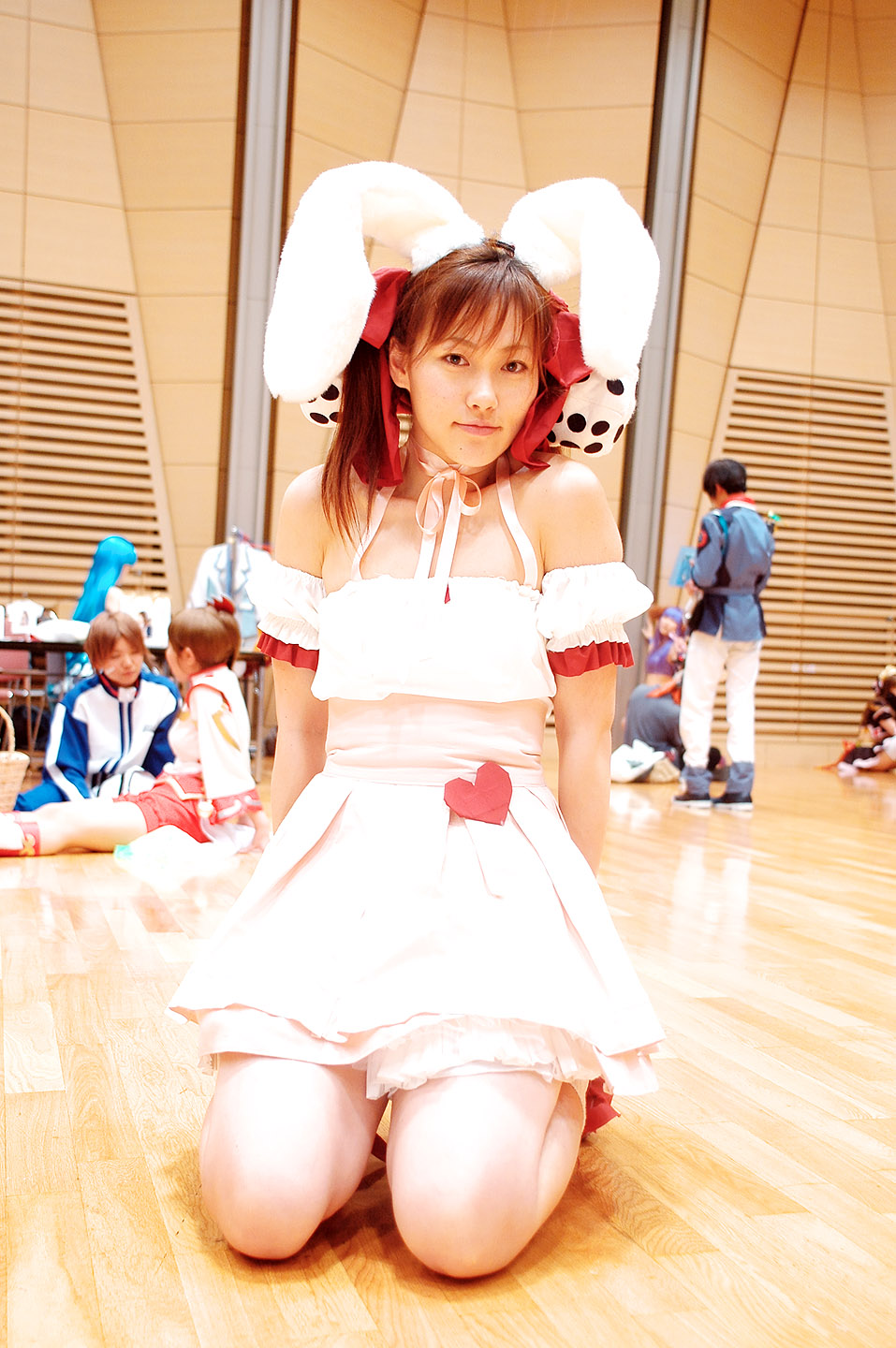 yuzu kotoki, usada hikaru, di gi charat, highres, photo (medium), animal ears, choker, cosplay, detached sleeves, dress, fuzzy dice, hair ribbon, laces, rabbit ears, ribbon, strapless, strapless dress