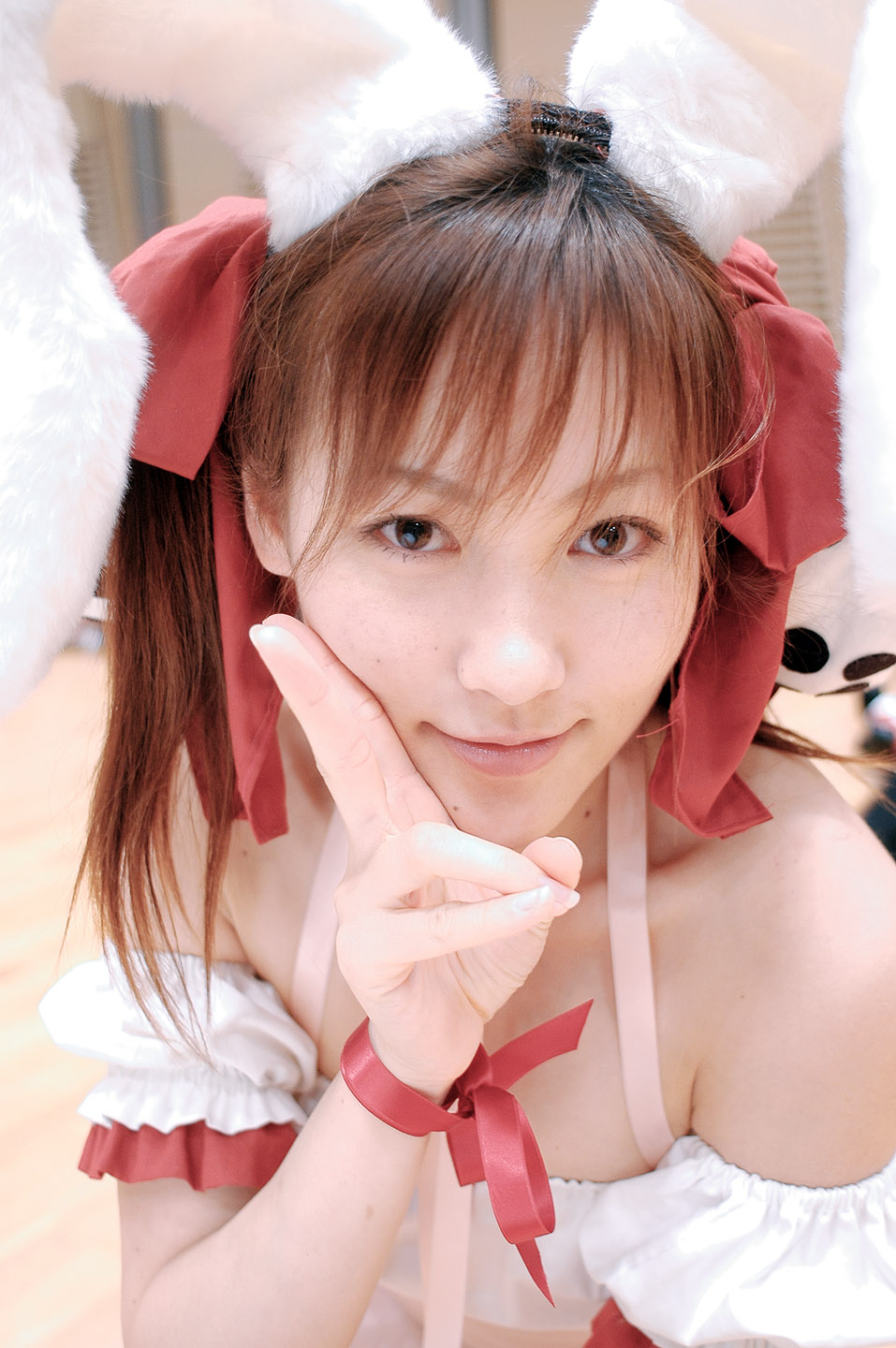 yuzu kotoki, usada hikaru, di gi charat, highres, photo (medium), animal ears, choker, cosplay, detached sleeves, dress, fuzzy dice, hair ribbon, laces, rabbit ears, ribbon, strapless, strapless dress