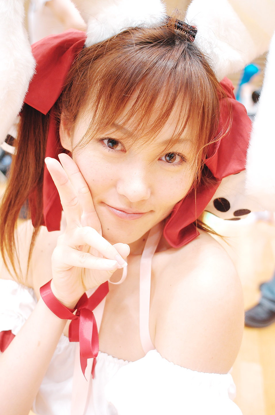 yuzu kotoki, usada hikaru, di gi charat, highres, photo (medium), animal ears, choker, cosplay, detached sleeves, dress, fuzzy dice, hair ribbon, laces, rabbit ears, ribbon, strapless, strapless dress