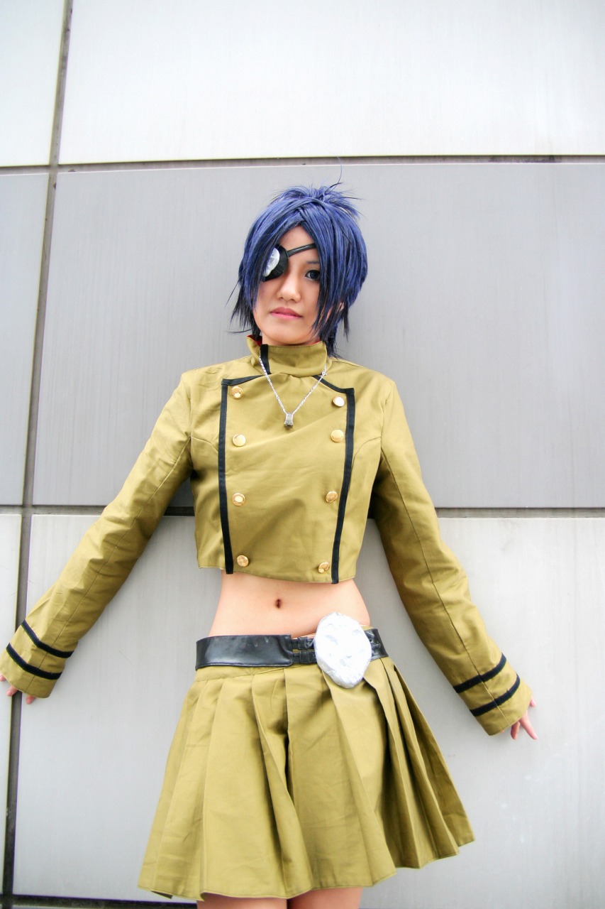isumi (i-spixi), chrome dokuro, katekyo hitman reborn!, highres, photo (medium), 1girl, blue hair, cosplay, eyepatch, female focus, midriff, pleated skirt, skirt, solo