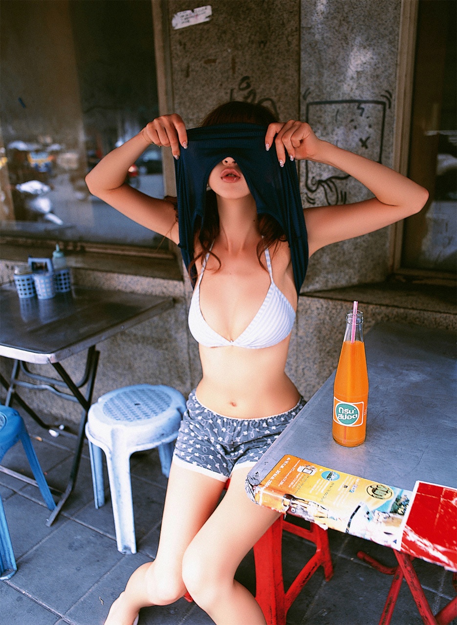 hoshino aki, highres, photo (medium), bikini, bikini top only, clothes lift, shirt lift, shorts, swimsuit, tank top